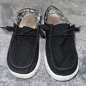 Black hey dudes with White Soles